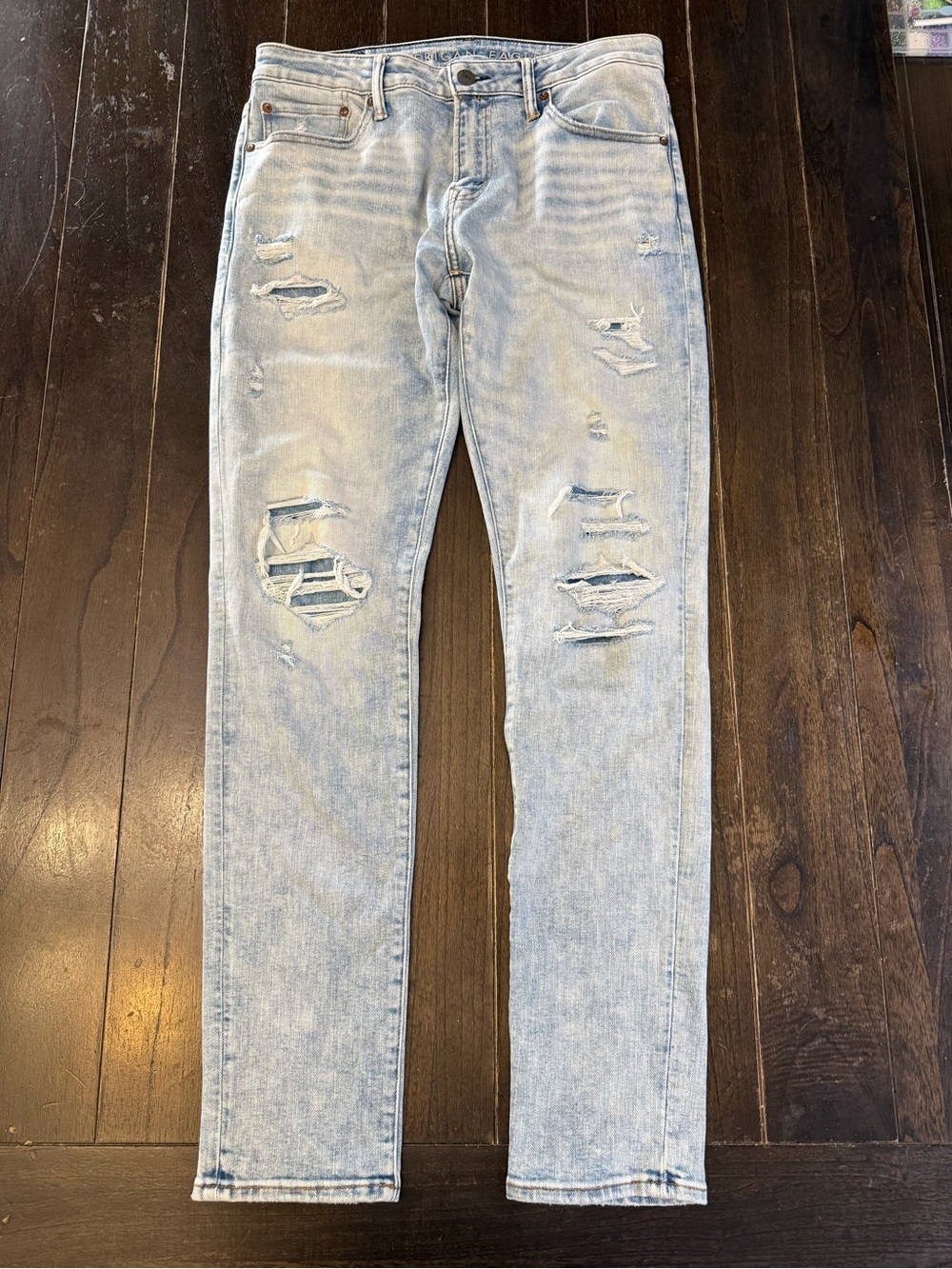 American Eagle Outfitters AirFlex Temp Tech Light Wash Skinny Ripped Jeans 32x34